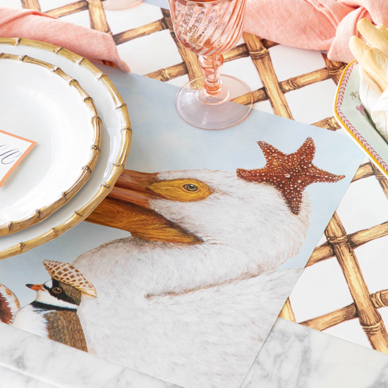 Shorebirds Placemat under a coastal place setting, on the Bamboo Lattice Runner.