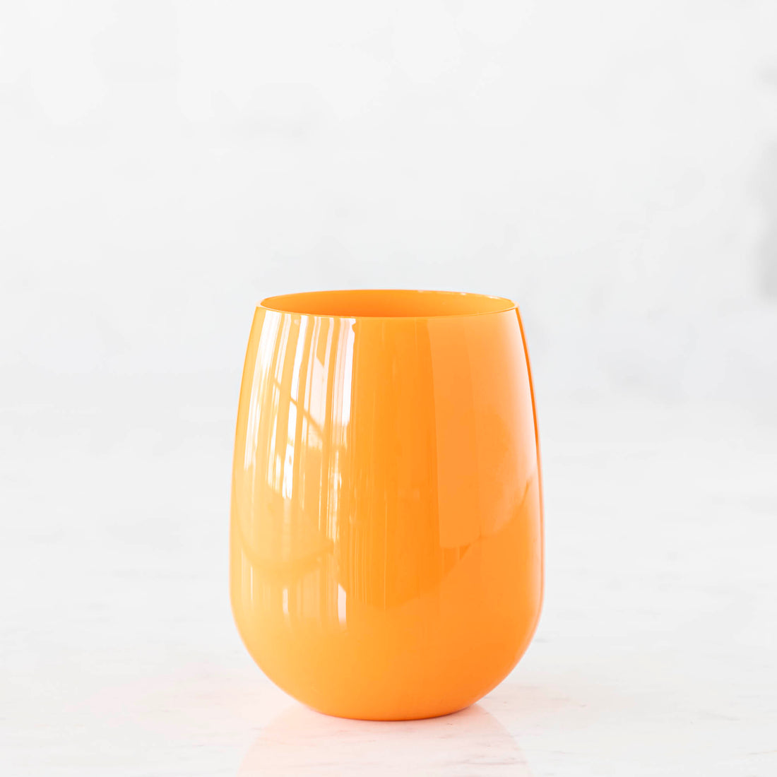 Single Orange SymGlass on white background