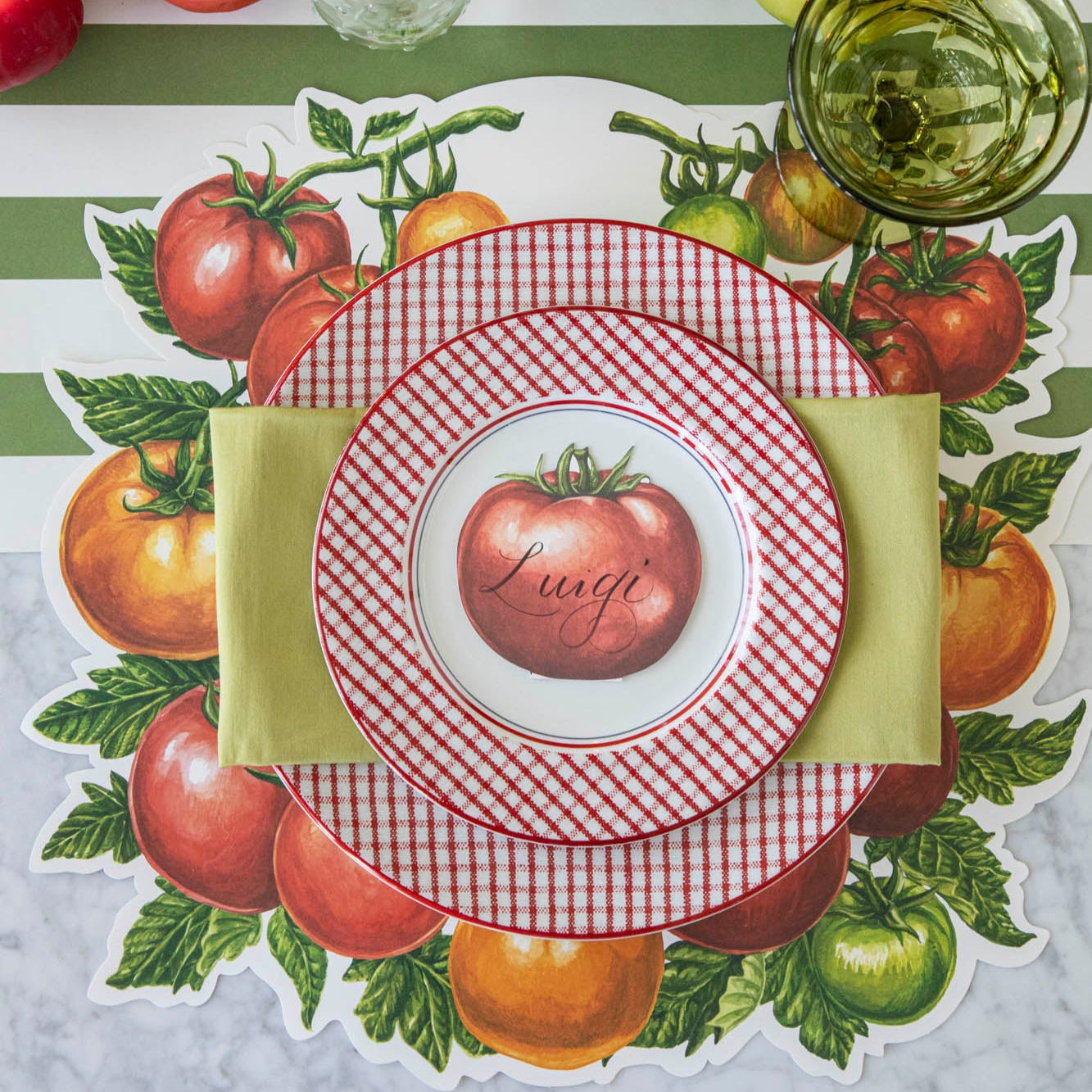 Die-cut Tomato Placemat on the Dark Green Classic Stripe Runner and summery place setting on top.