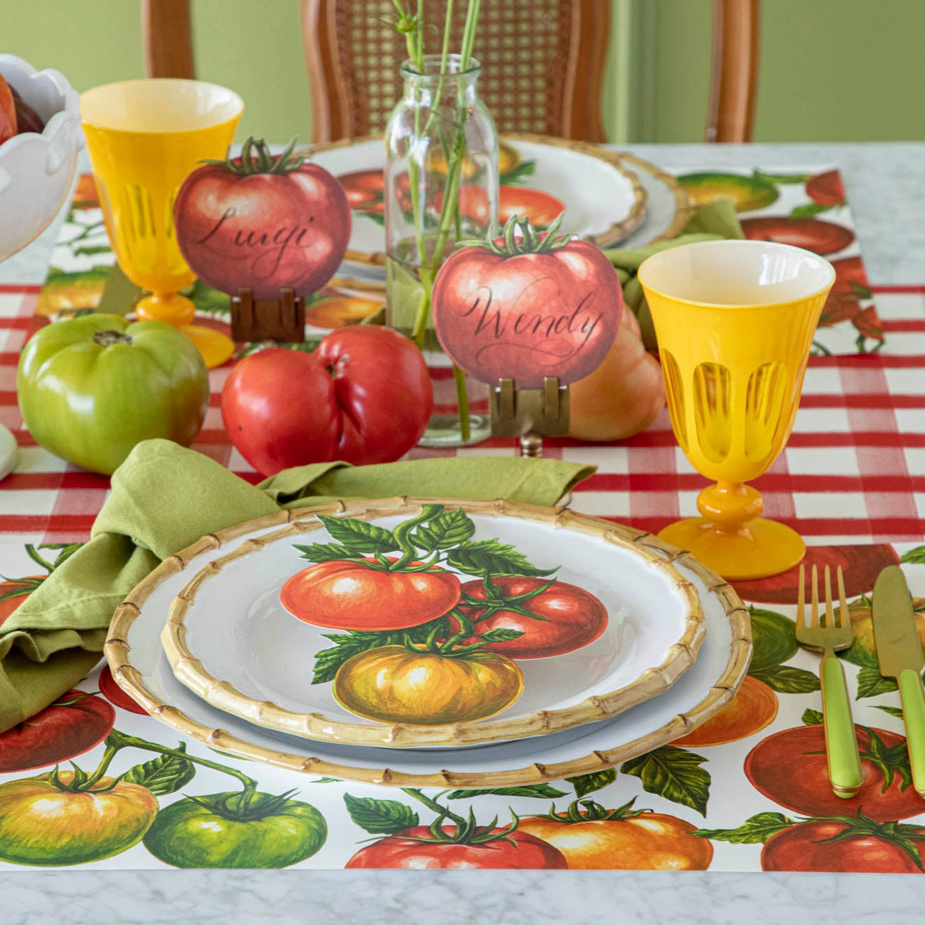 Tomato Vine Placemat under a place setting, on a summery, tomato themed table.