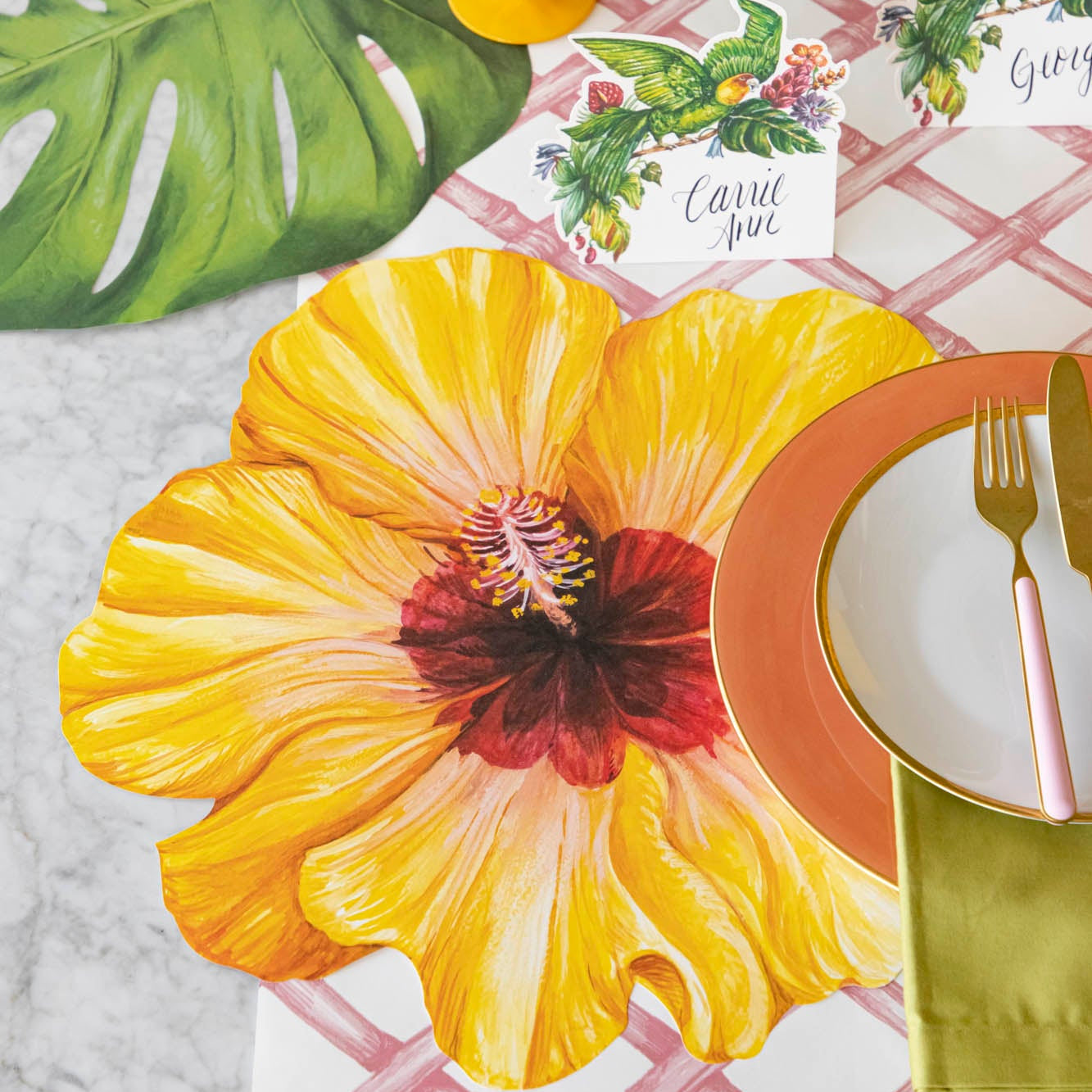 A tropical place setting with the Die-cut Hibiscus Placemat on the Pink Lattice Runner.