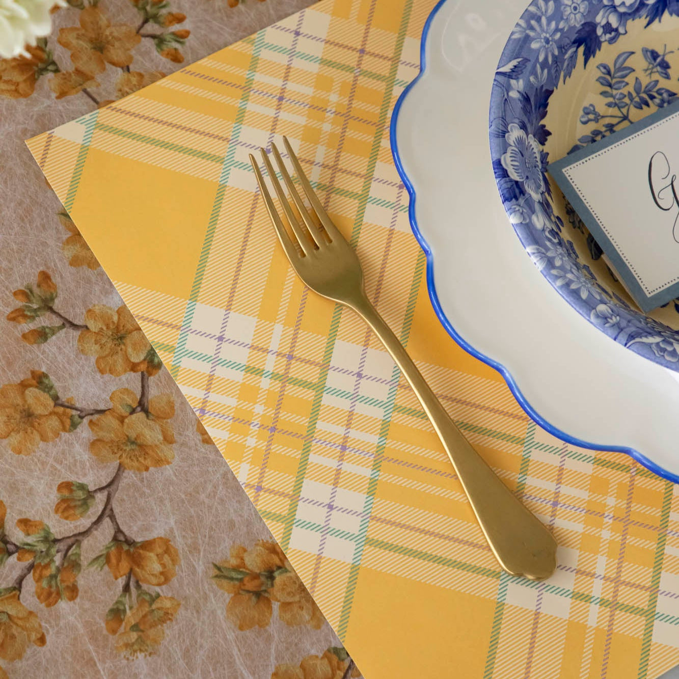 Marigold Cherry Blossom Runner under a bright and floral table setting.