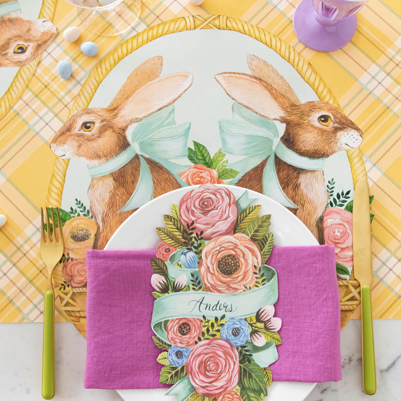 Die-cut Bunny Basket Placemat on the Yellow Plaid Runner, with a spring place setting on top.