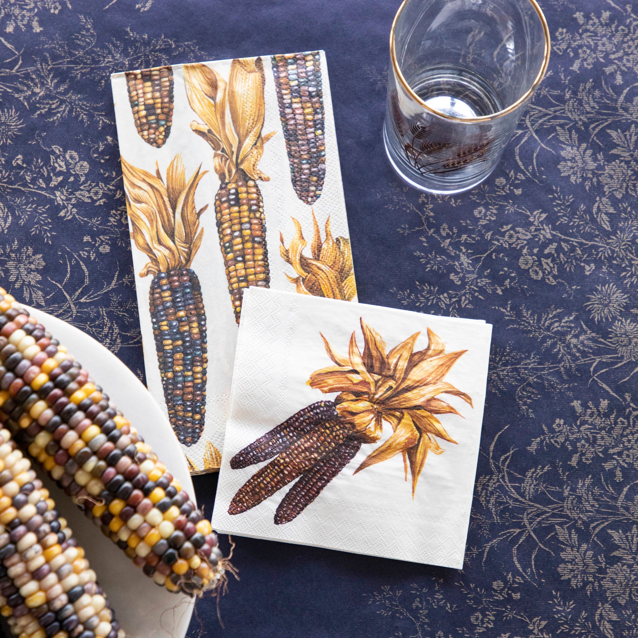 Two Maize Napkins, one Guest and one Cocktail, on an elegant table setting.