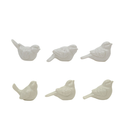 Six ceramic white birds.