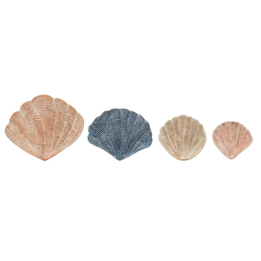 Set of 4 different sized shell shaped plates. 