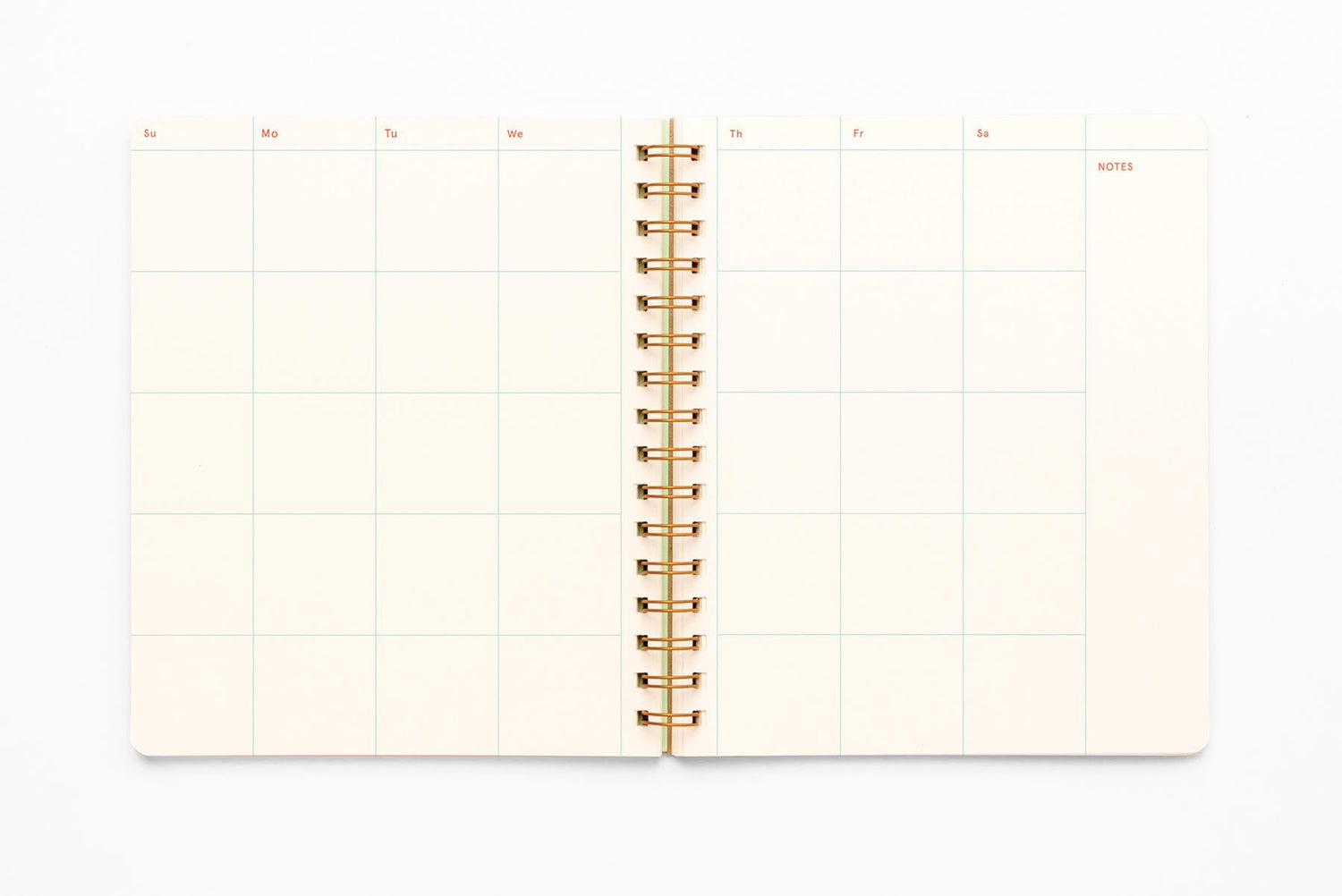 The inside of the Undated Letter Press Planner showing a blank monthly calendar across both pages.