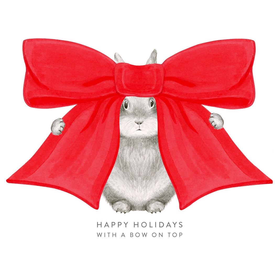 A card featuring a graphite bunny with a big red bow on its head