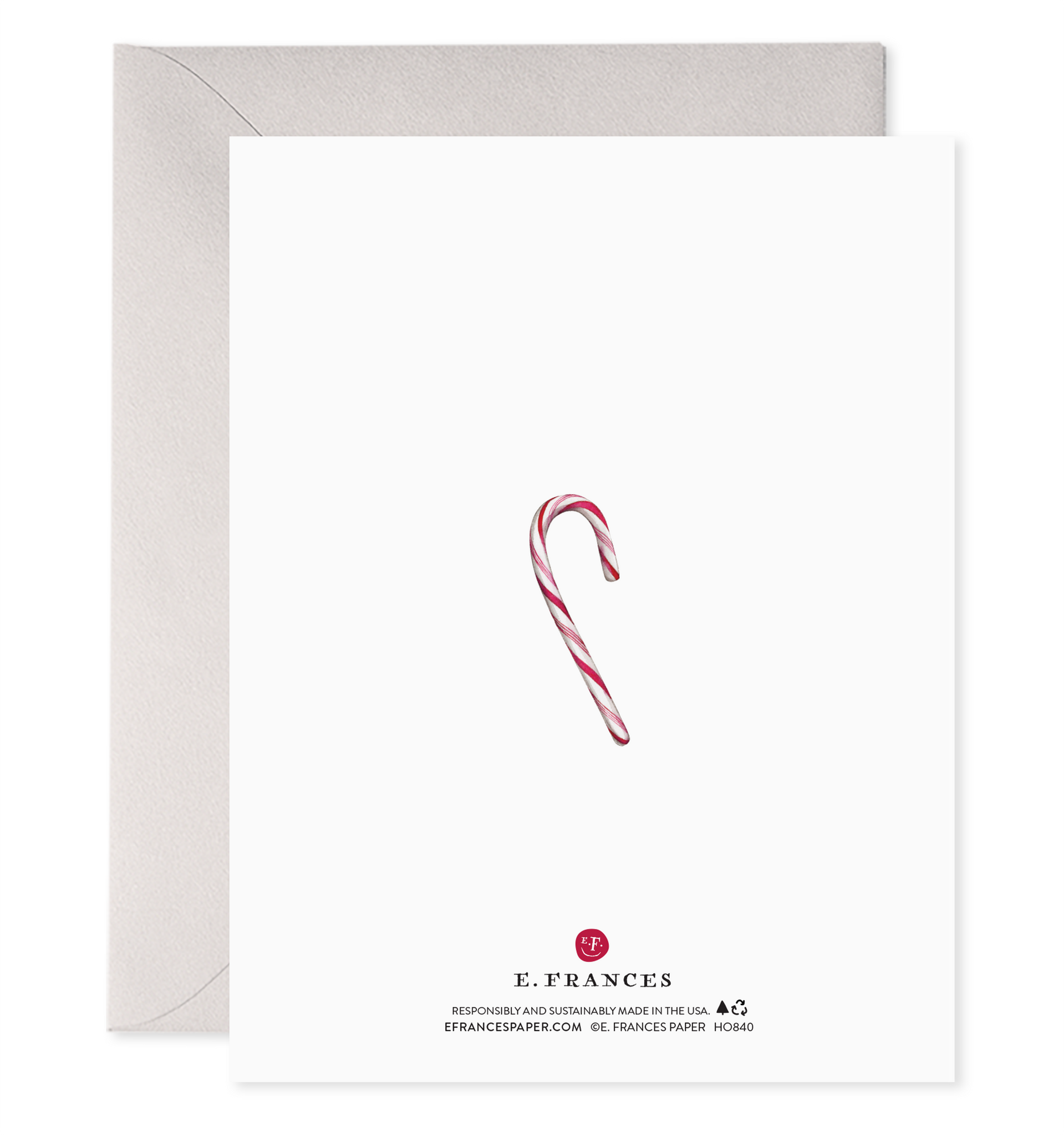 back of card with illustration of candy cane on it.