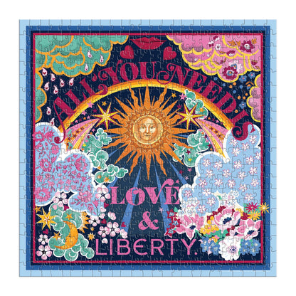 A jigsaw puzzle designed to look like a keepsake box with magnetic closure, titled &quot;Liberty All You Need is Love Puzzle&quot; featuring a colorful, Thorpe print design. It consists of the Liberty All You Need is Love 500 Piece Book Puzzle by Chronicle Books.