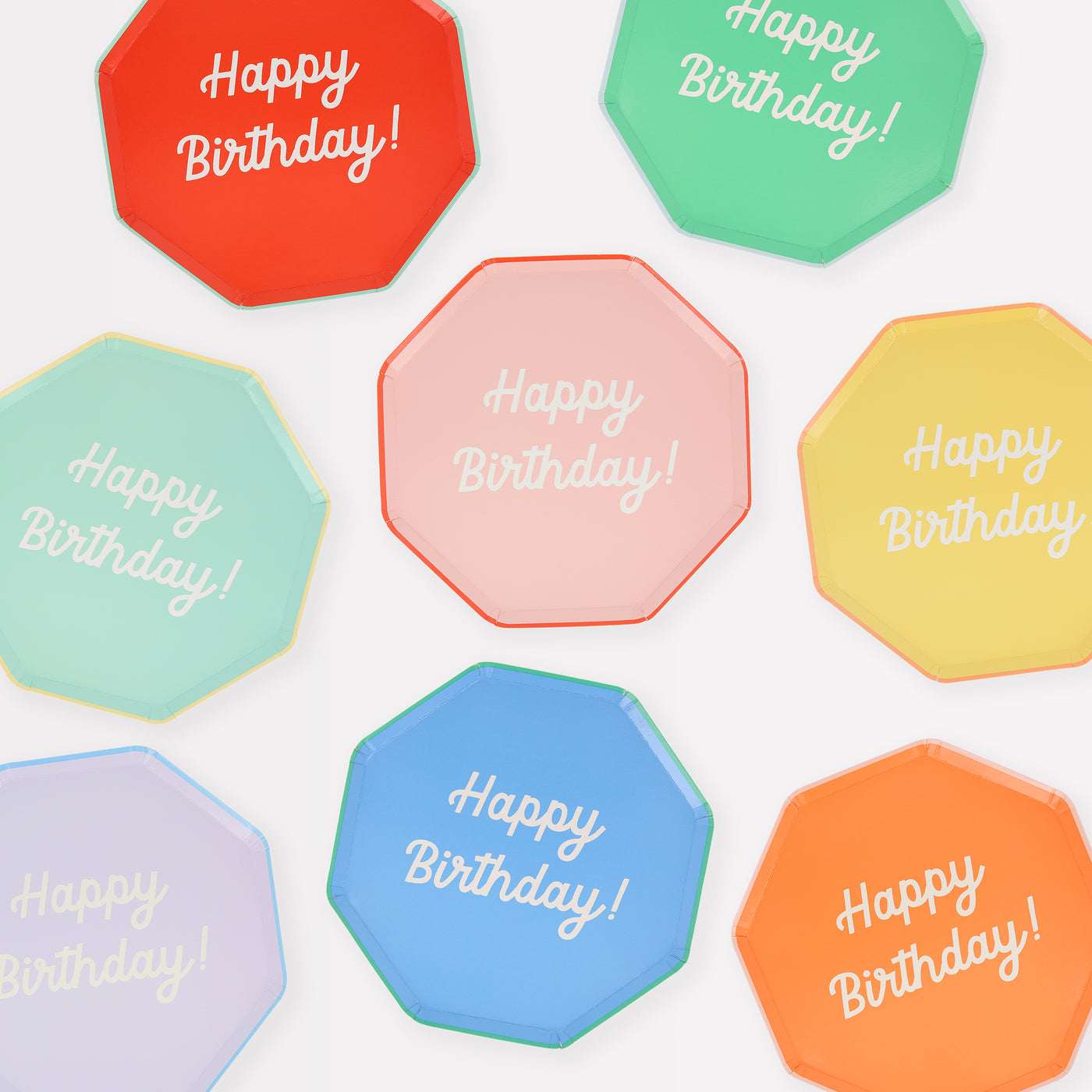 Octagonal shaped paper plates in  a red, pink, mint, orange, yellow, blue, lilac and green plate with co-ordinating colored borders saying &quot;Happy Birthday!&quot;. 