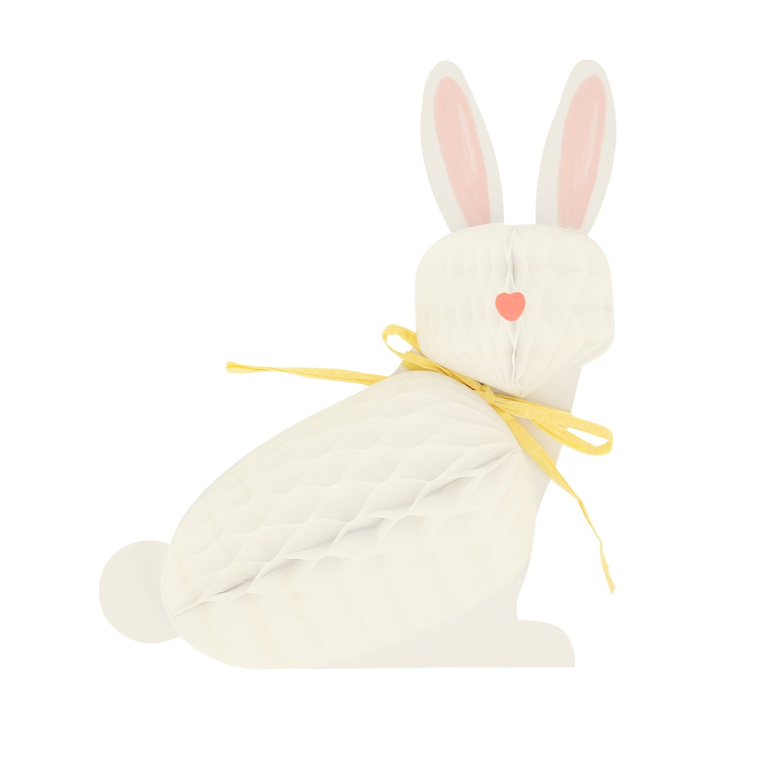 A white Bunny Honeycomb Decorations with a yellow ribbon sitting on a white background, surrounded by Easter decorations from Meri Meri.