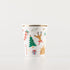 Jolly Christmas paper cup with various holiday ephemera printed on it