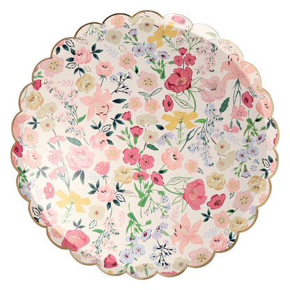 Four Meri Meri English Garden plates with floral designs on them.