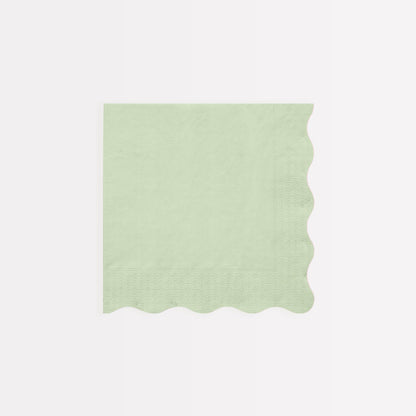 Four Ladurée Paris Assorted Napkins with scalloped borders from Meri Meri.