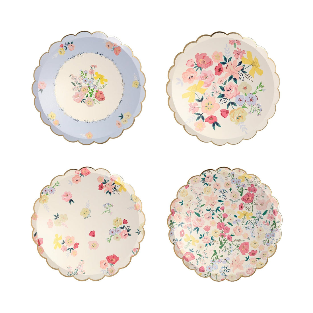 Four Meri Meri English Garden plates with floral designs on them.