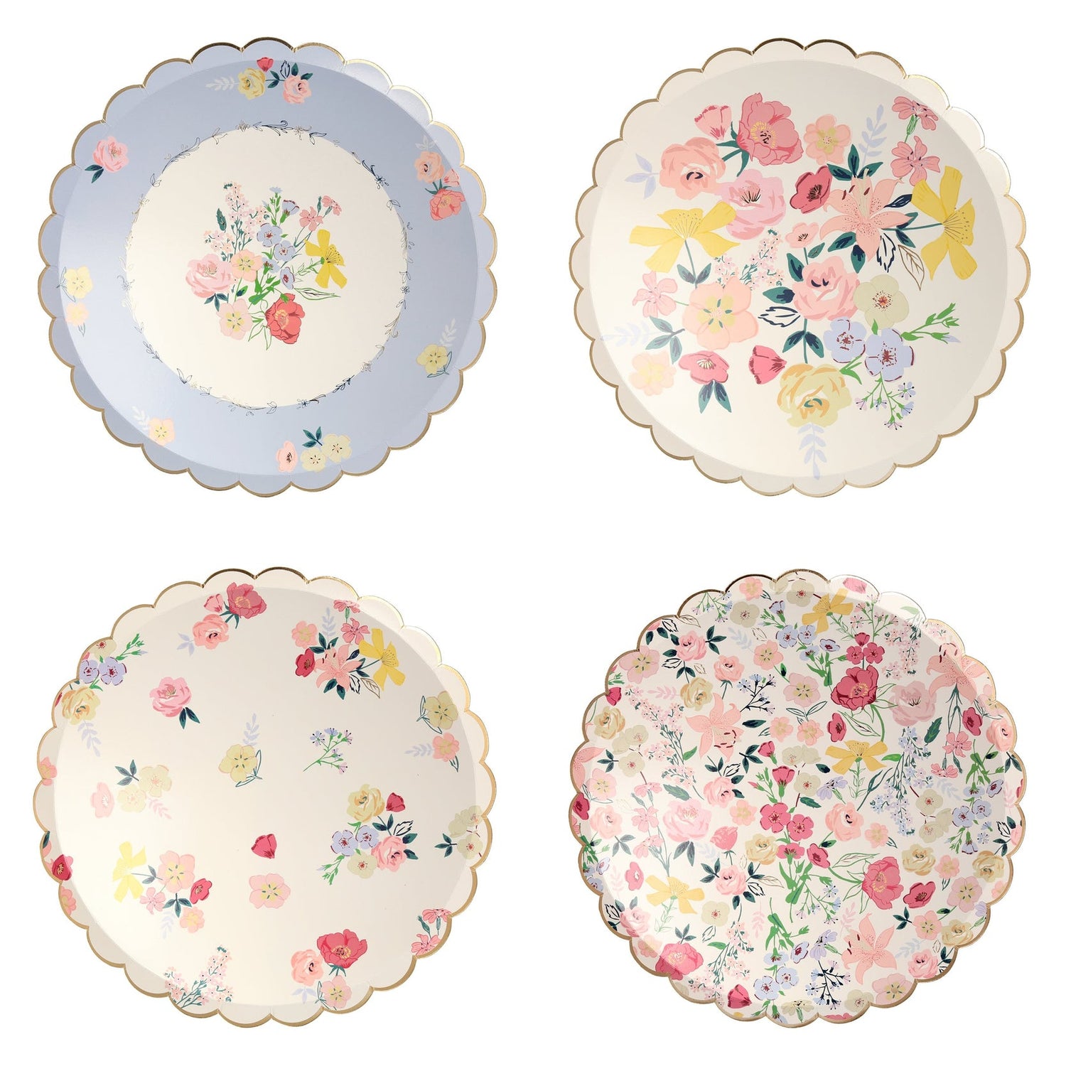 Four Meri Meri English Garden plates with floral designs on them.