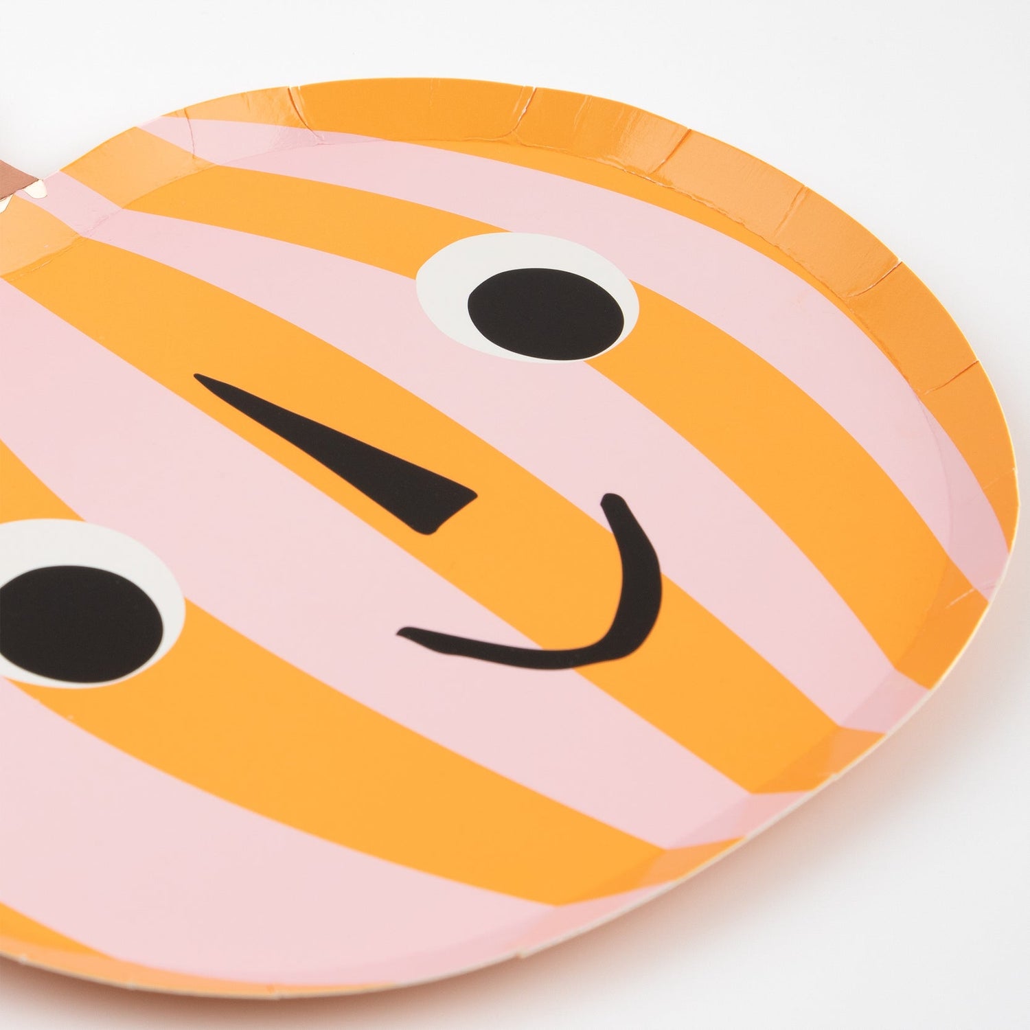 close up of pink and orange stripy plate