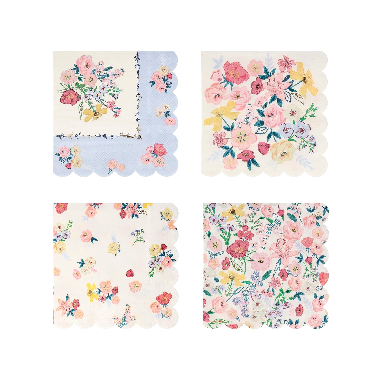 A set of Meri Meri English Garden Napkins with floral designs, perfect for a party table.