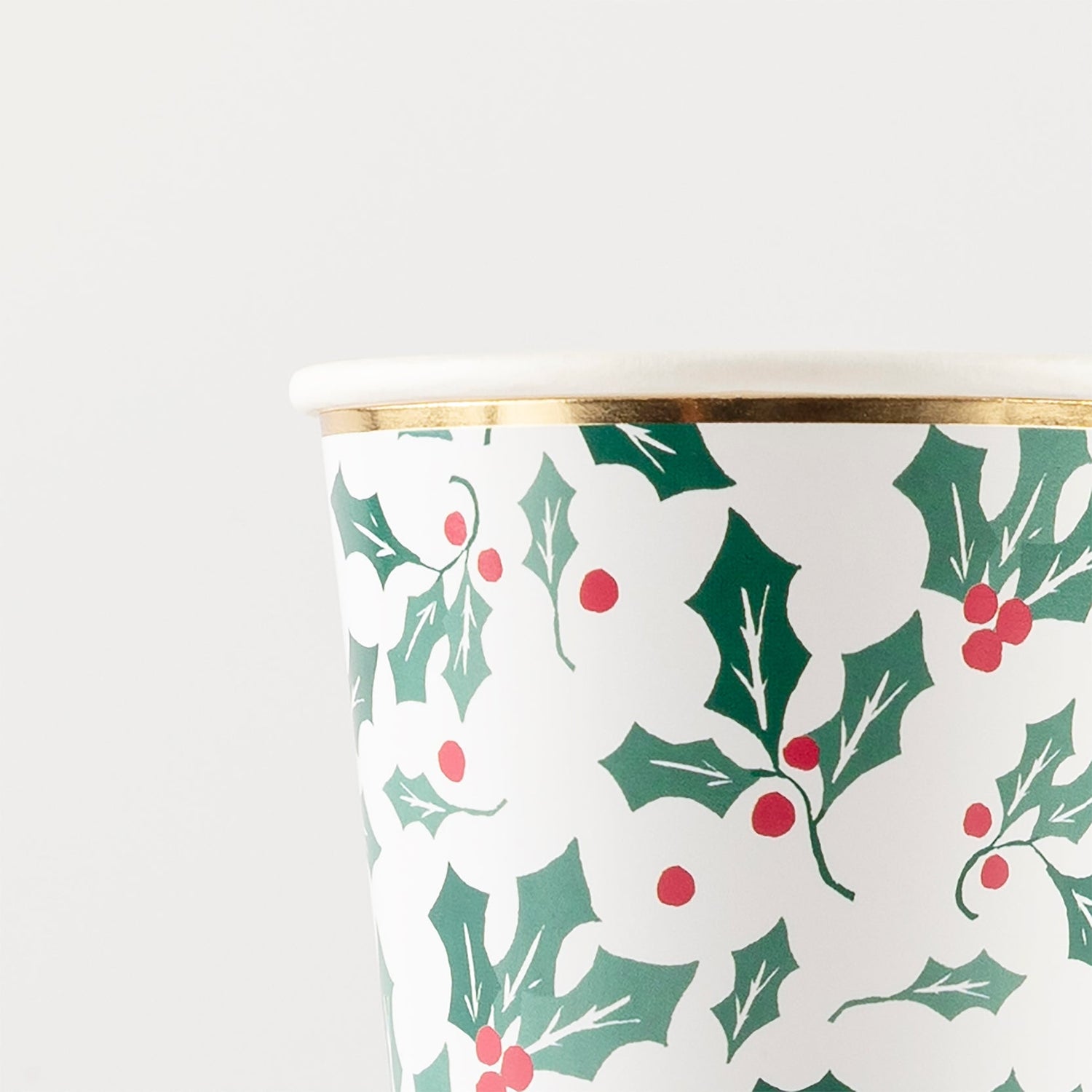 Close up of gold rim on Holly Pattern Cup