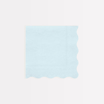 Four Ladurée Paris Assorted Napkins with scalloped borders from Meri Meri.