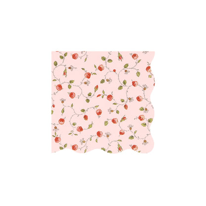 A pink Meri Meri Laduree Marie-Antoinette paper napkin with a floral pattern.