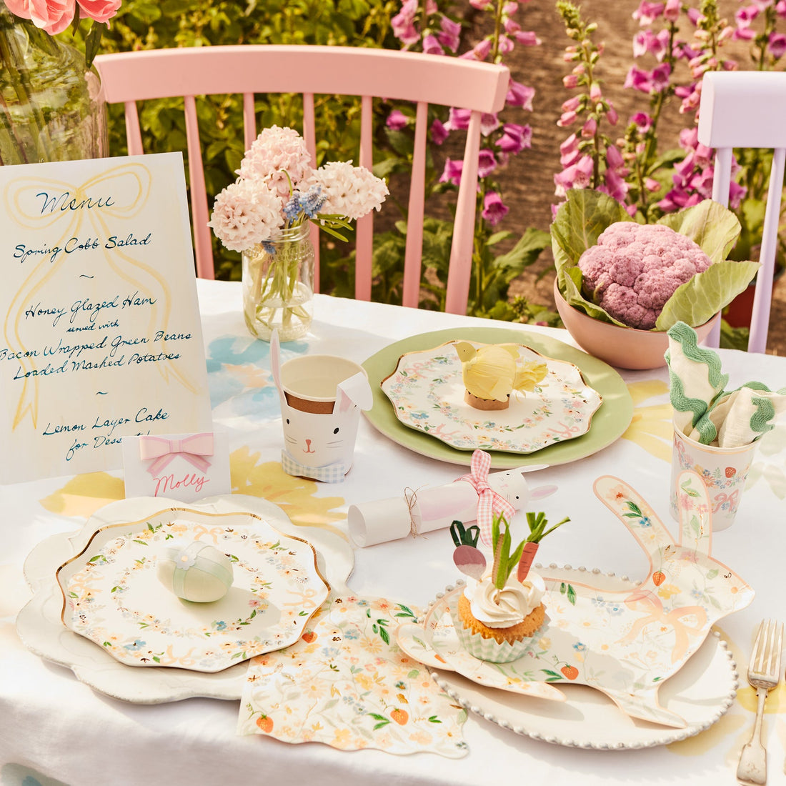 A white bunny with a pink bow on an Easter celebration Meri Meri Elegant Floral Bunny Shaped Plate.