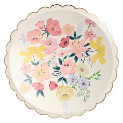 Four Meri Meri English Garden plates with floral designs on them.