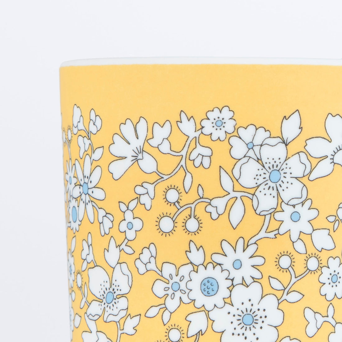 Close up of Meri Meri x Liberty melamine cups. 