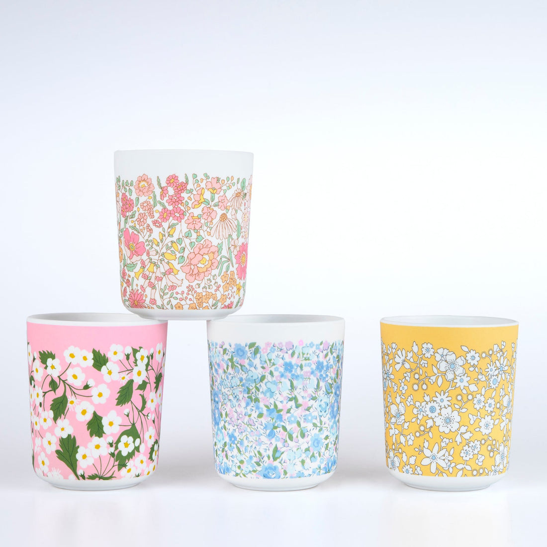 Meri Meri Melamine cups with a transfer print.  Each of the cups has a different Liberty print design, with colors that&