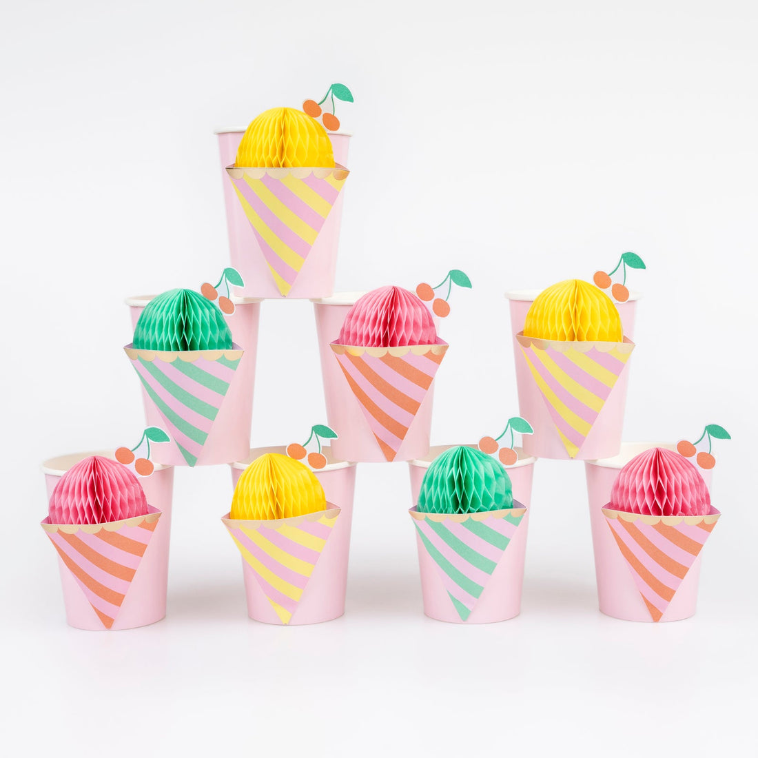 Meri Meri Ice Cream Cup set.  Each set includes 3 different color combinations, 2 x mint and pink, 3 x yellow and pink and 3 x coral and pink with honeycomb ice cream details, to be held open with the double-sided tape supplied. 