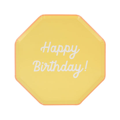 Octagonal shaped paper plate in yellow saying &quot;Happy Birthday!&quot;. 