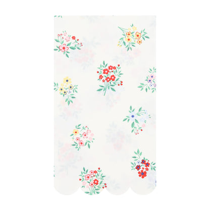 Meri Meri guest towel with posy bouquets printed on it. 