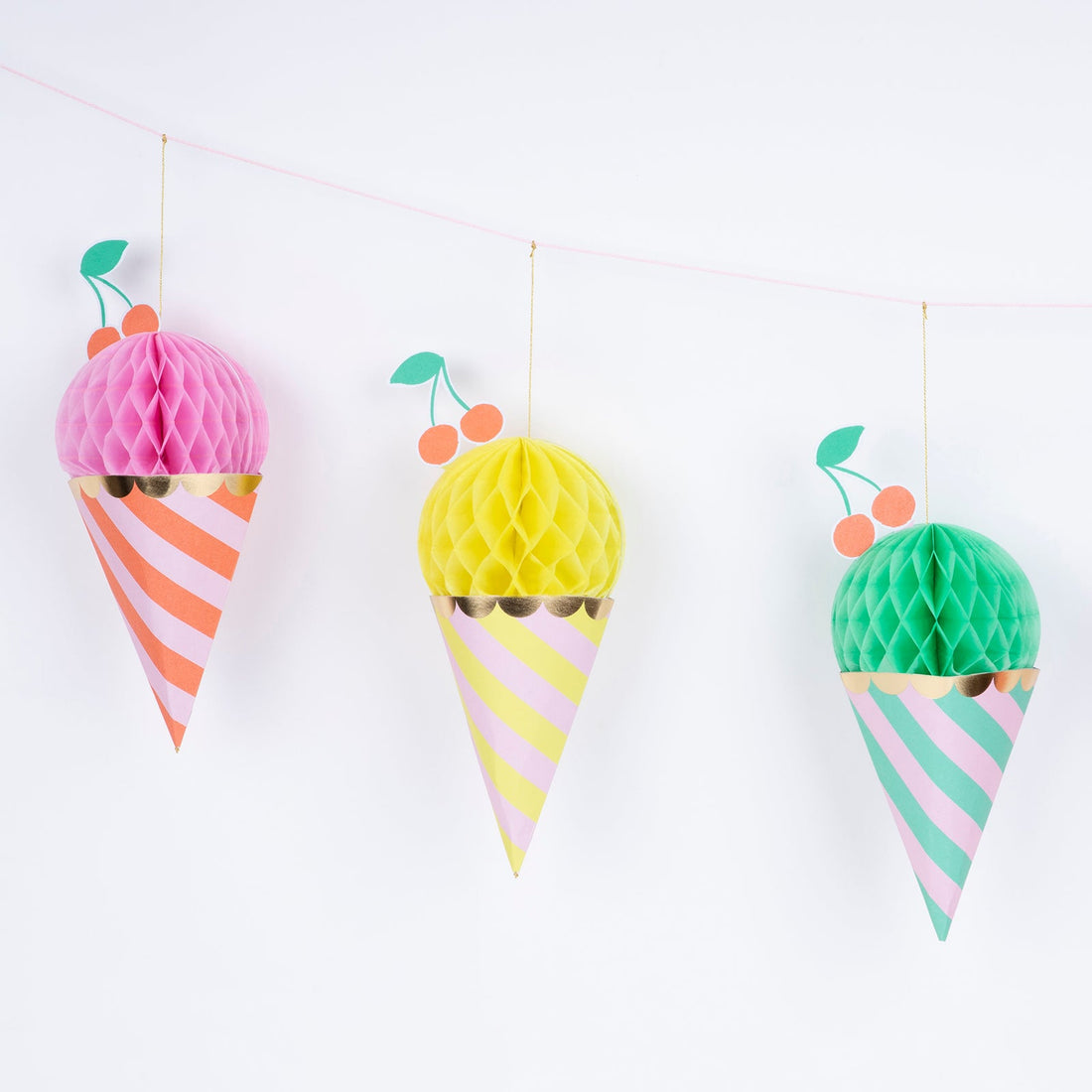 Meri Meri paper garland made up of 8 honeycomb ice creams with shiny gold foil details.