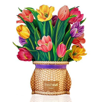 The back of the Mini Festive Tulips showing a purple ribbon going around the basket-like vase.