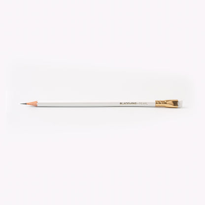 A Blackwing Pearl Pencils Set of 12 with a graphite core and white eraser next to its packaging box on a white background.