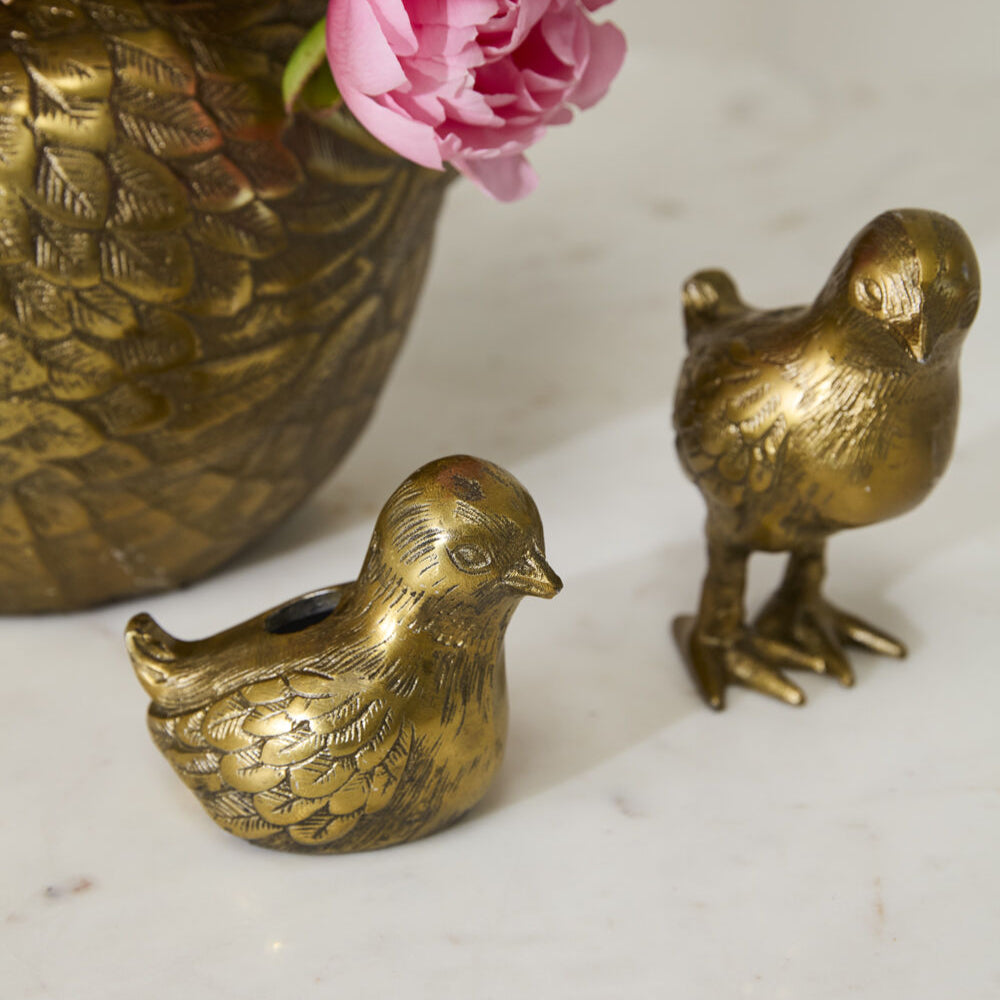 Spring Roost Budvases on a table.