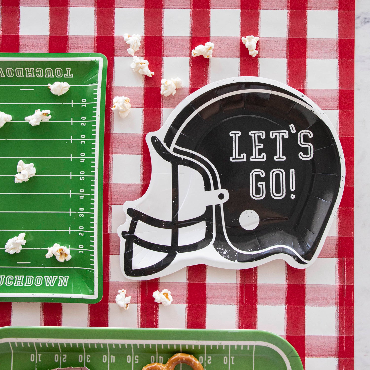 Football helmet paper plates with the words &quot;LET&