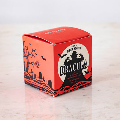 A Dracula themed box with a red background and black silhouettes.