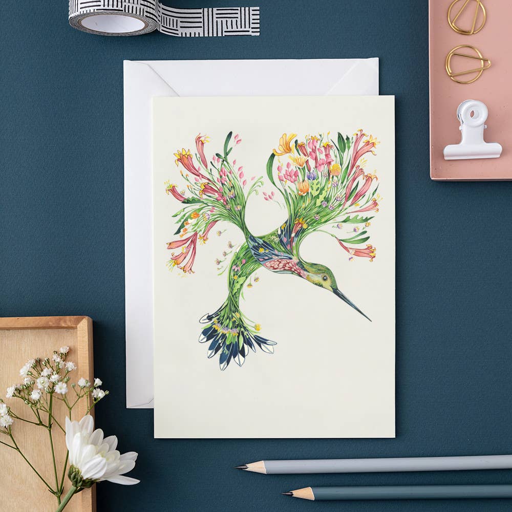 A high-quality Hummingbird Card featuring a watercolour painting of a hummingbird by artist Daniel Mackie from The DM Collection.