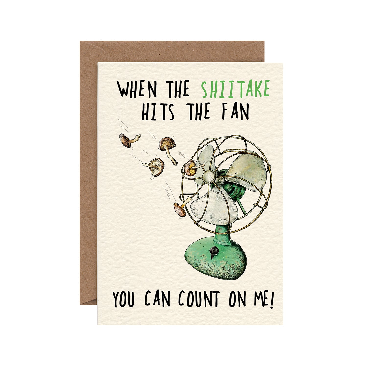 A funny illustration of a vintage green desk fan with several mushrooms flying toward the blades, with the caption &quot;When The Shitake Hits The Fan, You Can Count On Me!&quot;