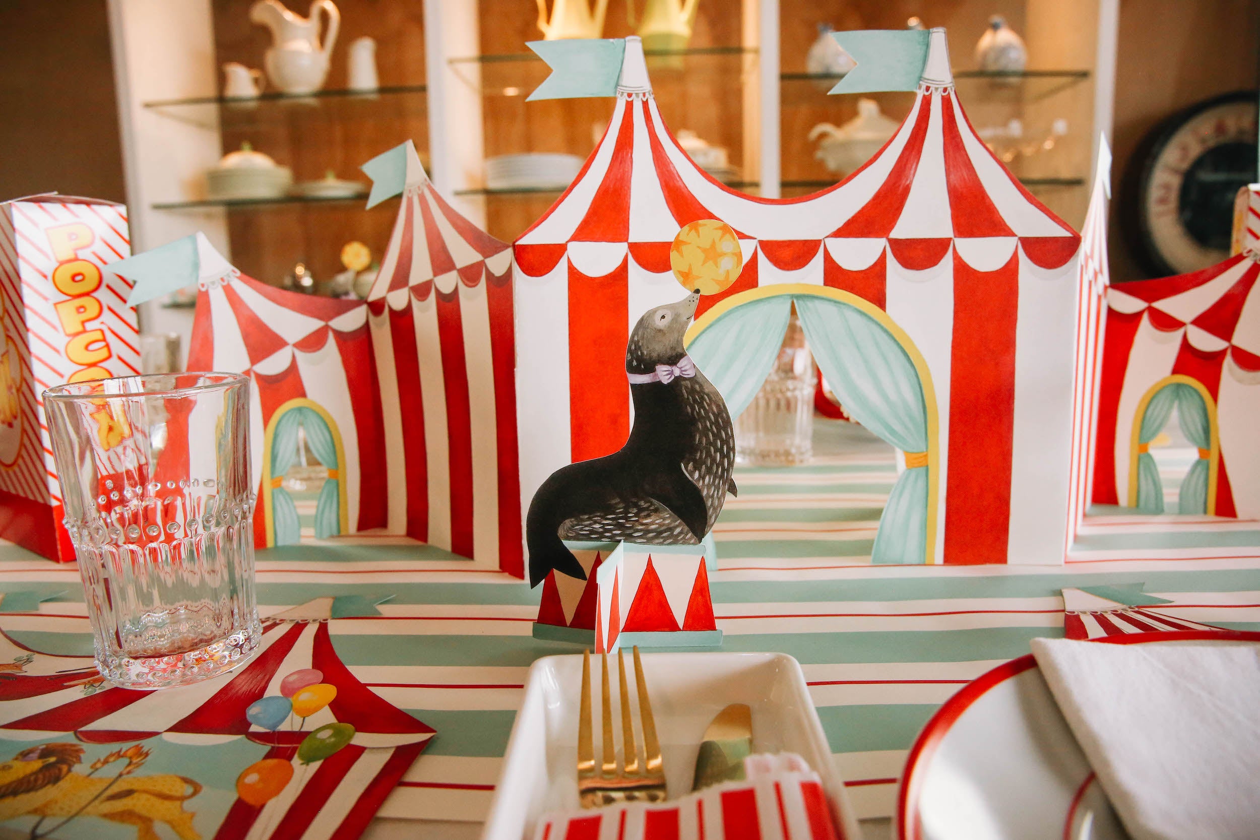 A red and white striped Hester &amp; Cook Circus Tent Centerscape.