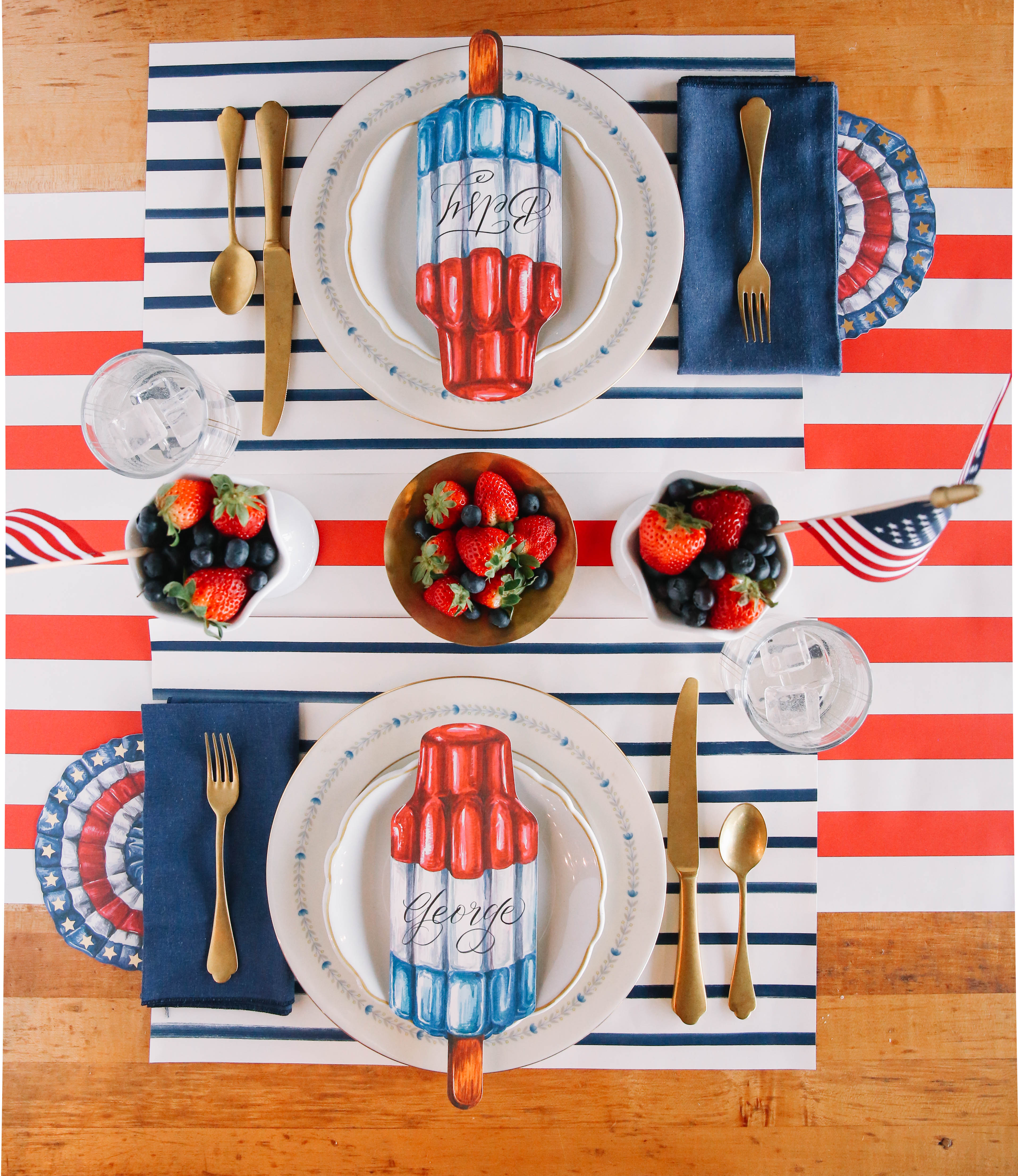 The Navy Stripe Placemat under a patriotic table setting for two, from above.