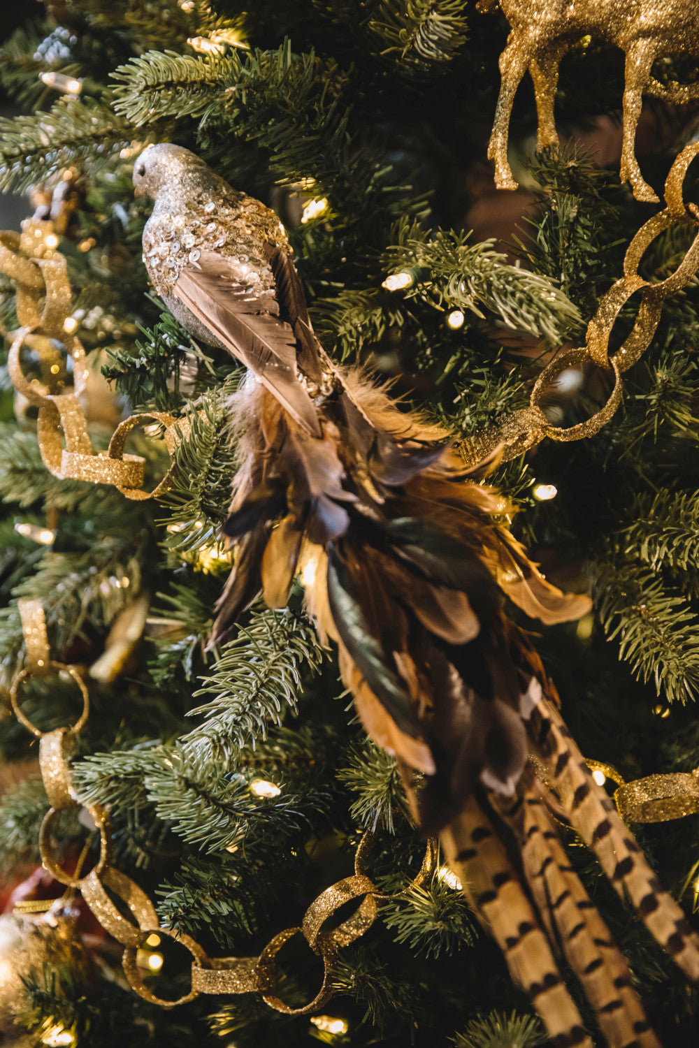 tail feathers of silver glitter bird ornament