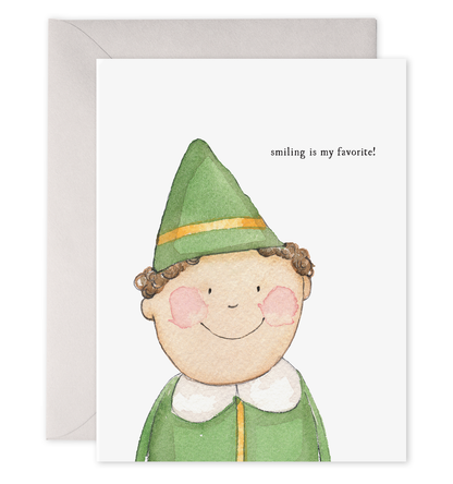 Front of card with illustration of an elf smiling on it that says &quot;smiling is my favorite&quot; 