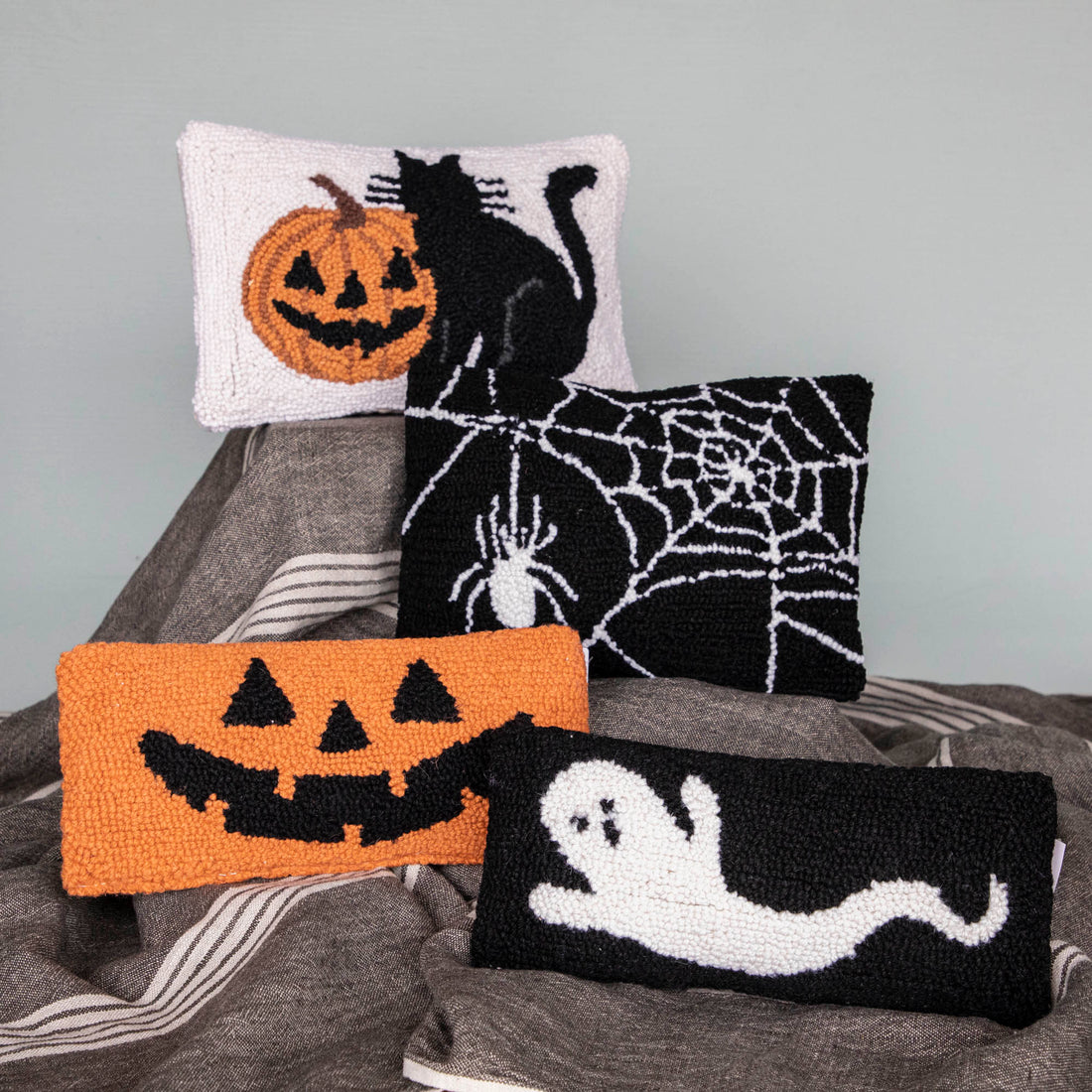 Halloween pillows grouped together 