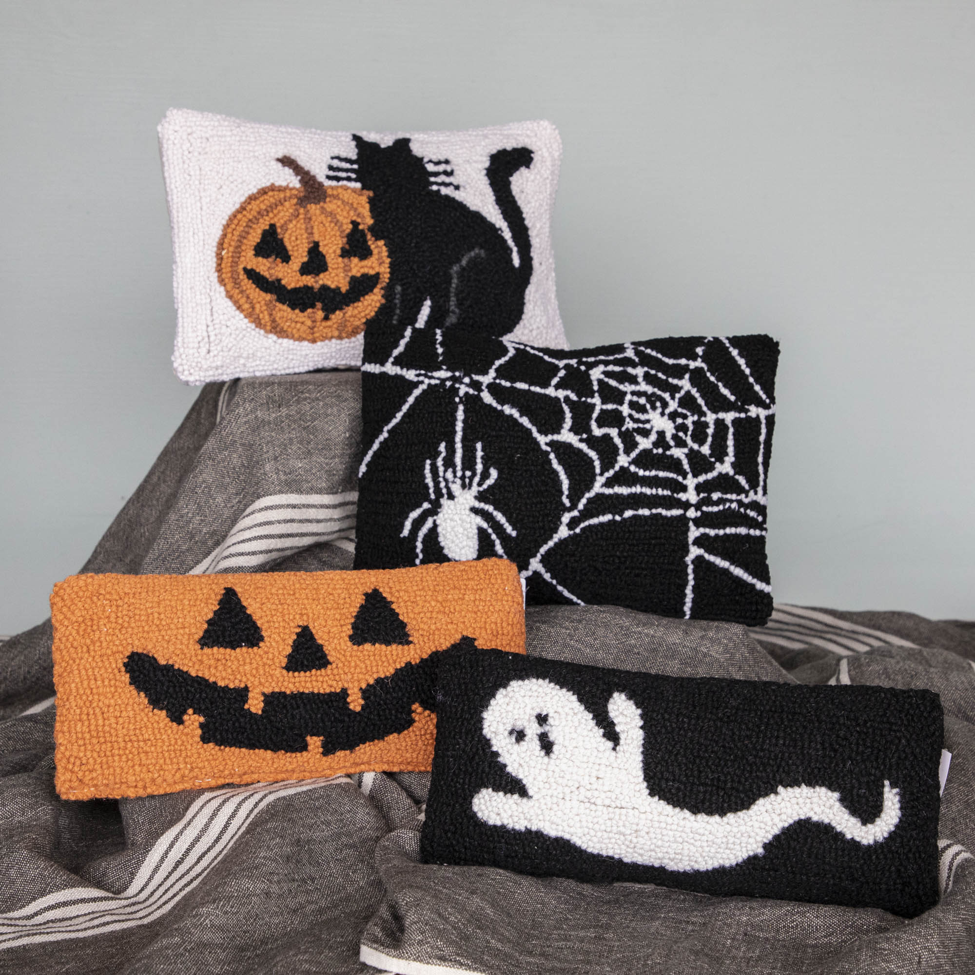 Halloween pillows grouped together 