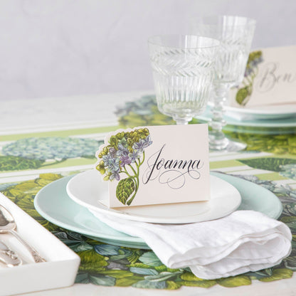 Hester &amp; Cook Hydrangea Place Card holders featuring multicolored blooms placed on a table setting.