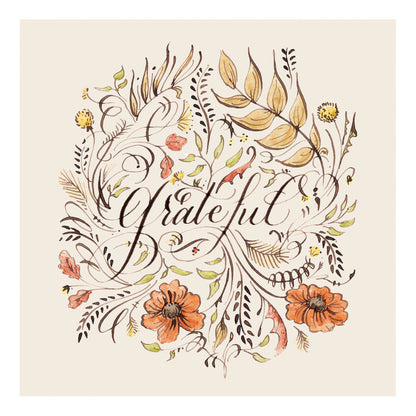 A square cocktail napkin featuring beautiful calligraphy reading &quot;grateful&quot; in deep brown, surrounded by brown, orange and yellow florals and filigree, on a white background.