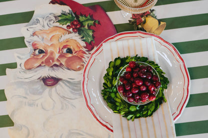 The Die-cut Santa Placemat under a festive Christmas place setting, from above.